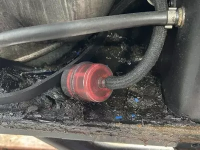 Blocked and contaminated diesel fuel filter on industrial hot pressure washer before full service and refurbishment